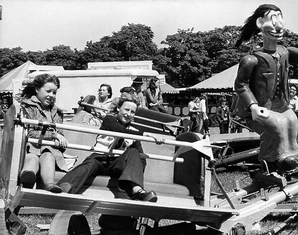 Youngsters on the Roundabout ride at the Hoppings fair, held on the Town Moor in