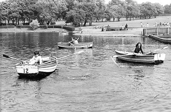 Youngsters take a rowing boat on Saltwell Park lake in 1981