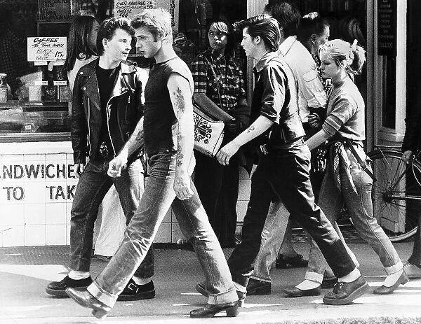 Youth Teddy Boys marching up the Kings Road in London. 30th July 1977