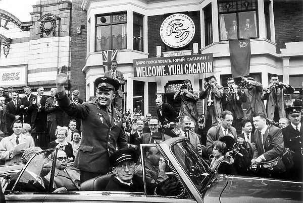 Yuri Gagarin July 1961 Russian Spaceman waves from a car outside headquaters of
