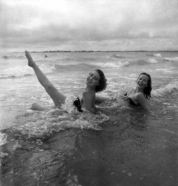 Yvonne Marsh and Ann Hanslip seen here bathing in the sea at West Wittering