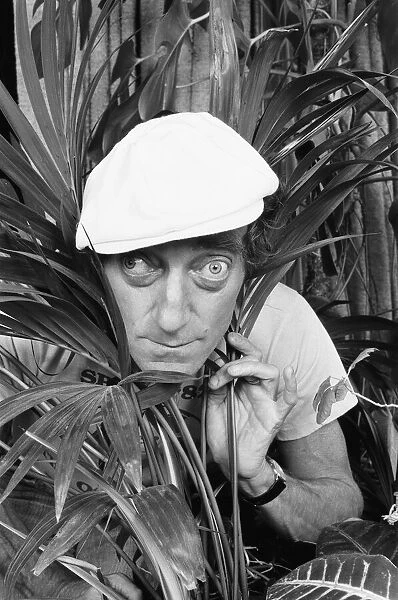 Zany comedian Marty Feldman seen here posing for the Daily Mirror 29th August 1982