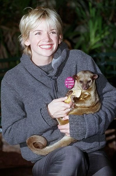 Zoe Ball Radio  /  TV Presenter October 1998 At London Zoo holding a baby bear she has