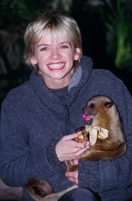 Framed Print : Zoe Ball Radio  /  TV Presenter October 1998 At London Zoo holding a baby bear she has