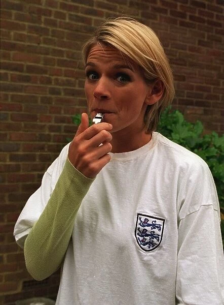 Zoe Ball TV Presenter whistles for England