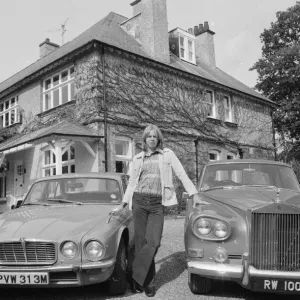 Rick Wakeman Print, a 1975 photograph of the musician with his cars