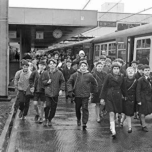 Around 1, 200 schoolchildren walking along the platform to board one of two special