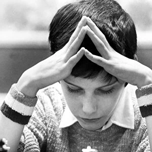 11 year old Simon Florence concentrates hard in his chess match