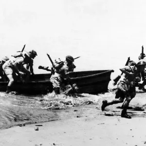 11th Battalion Royal Marines run ashore from a dingy while training in Ceylon 11th Battalion Royal Marines run ashore from a dingy while training in Ceylon