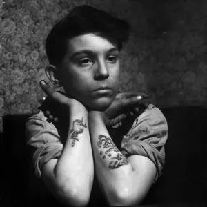 1956 Print of a 14-year-old boy with tattooed forearms 1956 Print of a 14-year-old boy with tattooed forearms