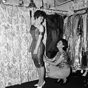 14 year old singer Helen Shapiro, trying on clothes at "Mary Fair"dress shop