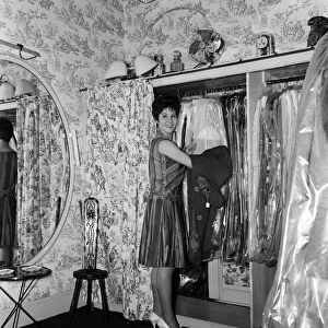 14 year old singer Helen Shapiro, trying on clothes at "Mary Fair"dress shop