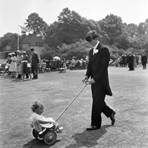 15 year old Hugh Pryor the Eton Boy from Reading with 12 months old Isabel his niece in