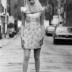 Black and white Print of Penny Brahms in a white and silver beaded dress Black and white Print of Penny Brahms in a white and silver beaded dress