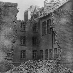 Print of a breached prison wall at Amiens