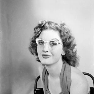 19 Yrs old actress Shirley Lorimer displaying the spectacles. May 1953 D2541-002