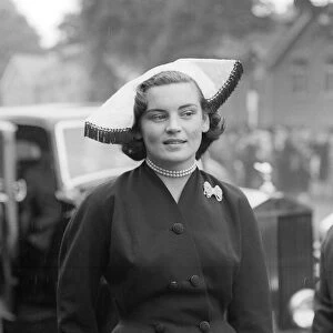 1953 Clothing Ascot Fashion Mrs W Ofner wearing a white fur hat with navy blue