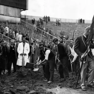 1958 British Empire and Commonwealth Games - workmen digging up the track at Cardiff Arms 1958 British Empire and Commonwealth Games - workmen digging up the track at Cardiff Arms