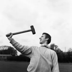 1960 - 1961 Tottenham Hotspur Double Winning Season. Cliff Jones pictured holding a