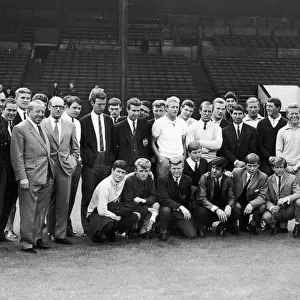 1964... and a couple of strangers have slipped into the team picture as Manchester United