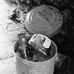 1972 Miners Strike. Ash bin at the back of a terrace overlooking the Monmouthshire Valley