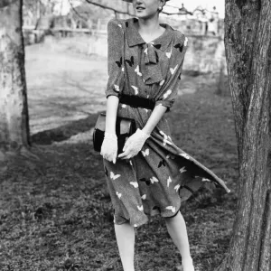 1980s Womens Fashion Print: Butterfly Motif Belted Dress