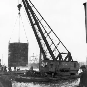 250 ton crane lifting a new turbine for Deptford Power Station. 29th April 1949 250 ton crane lifting a new turbine for Deptford Power Station. 29th April 1949