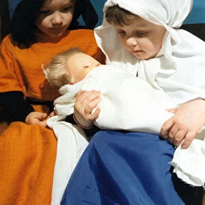 3-Year-Olds James Newman and and Anna Davies with baby Jesus at St George