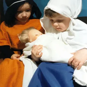3-Year-Olds James Newman and and Anna Davies with baby Jesus at St George 3-Year-Olds James Newman and and Anna Davies with baby Jesus at St George