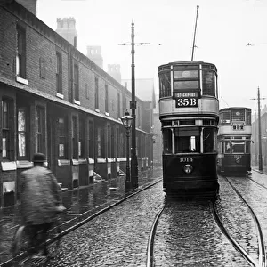 The 35B tram to Stockport travels down Upper Lloyd Street, Moss Side, Manchester