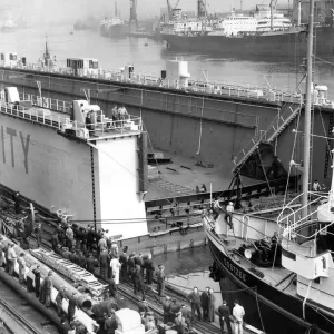 This 400 foot floating dock, built by Swan Hunter and Wigham Richardson This 400 foot floating dock, built by Swan Hunter and Wigham Richardson