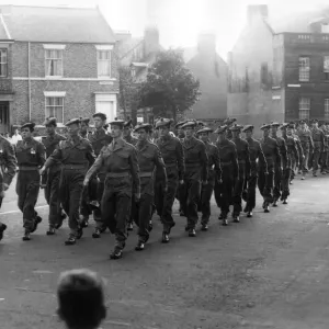 439 Tyne L. A. A. T. A. Regiment marching through Tynemouth on the way to a Church Parade 439 Tyne L. A. A. T. A. Regiment marching through Tynemouth on the way to a Church Parade