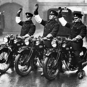 Three of the 500 Metropolitan policemen who are to go on traffic patrol duty