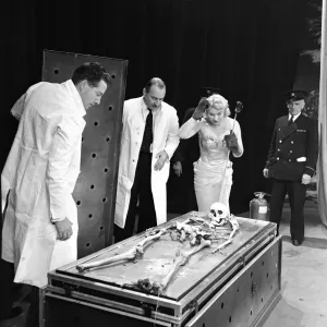 7 of 9 - June returns to the extinguished coffin to find a skeleton, supposedly 7 of 9 - June returns to the extinguished coffin to find a skeleton, supposedly