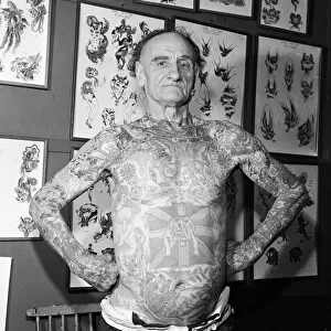 72-year-old Wilf Hardy whos body is covered in tattoos. 8th December 1979