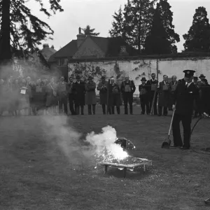 A. R. P. demonstration at Esher. Wardens seen here being given training on how to deal with A. R. P. demonstration at Esher. Wardens seen here being given training on how to deal with