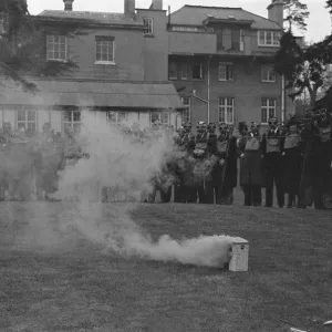 A. R. P. demonstration at Esher. Wardens wearing thir gas masks. April 1938 A. R. P. demonstration at Esher. Wardens wearing thir gas masks. April 1938