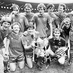 Aberdeen football players team celebrate after winning the 1983 Scottish FA Cup trophy