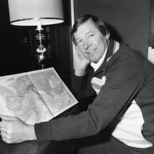 Aberdeen manager Alex Ferguson looks at a map of Europe as he prepares to takes his side Aberdeen manager Alex Ferguson looks at a map of Europe as he prepares to takes his side