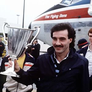 Aberdeen team captain Willie Miller with the European Cup Winners Cup trophy after their