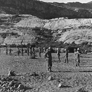 Abyssinian War October 1935 Italian troops passing stones down a human chain for