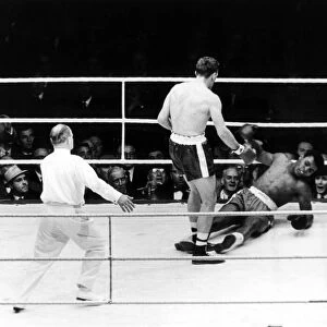 Action during the non-title heavyweight fight between American Cassius Clay
