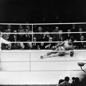 Action during the non-title heavyweight fight between American Cassius Clay Action during the non-title heavyweight fight between American Cassius Clay