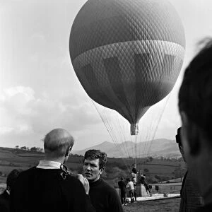Actor Albert Finney goes for a balloon ride while making the film "