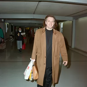 Actor and comedian, Rik Mayall, pictured at London Airport. 29th March 1992