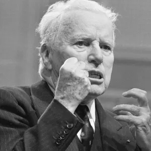 Actor and director Charlie Chaplin legend of the silent movies celebrates his 77th Actor and director Charlie Chaplin legend of the silent movies celebrates his 77th
