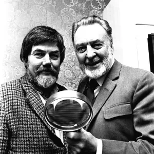 Actor Donald Sinden was presented with an enormous magnifiying glass by namesake David