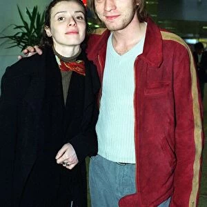 Actor Ewan McGregor and his wife Eve arrive at Glasgow Airport for the Film Festival