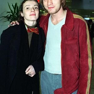 Actor Ewan McGregor and his wife Eve arrive at Glasgow airport for the Scottish