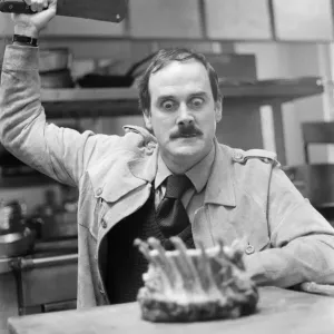 Print of John Cleese at The Midland hotel in Birmingham, chopping meat Print of John Cleese at The Midland hotel in Birmingham, chopping meat